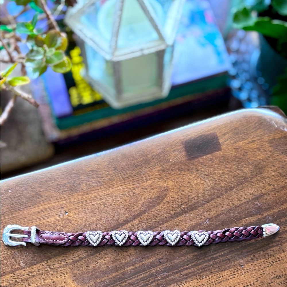 Brighton leather braided bracelet w/buckle closure and silver hearts. Adjustable
